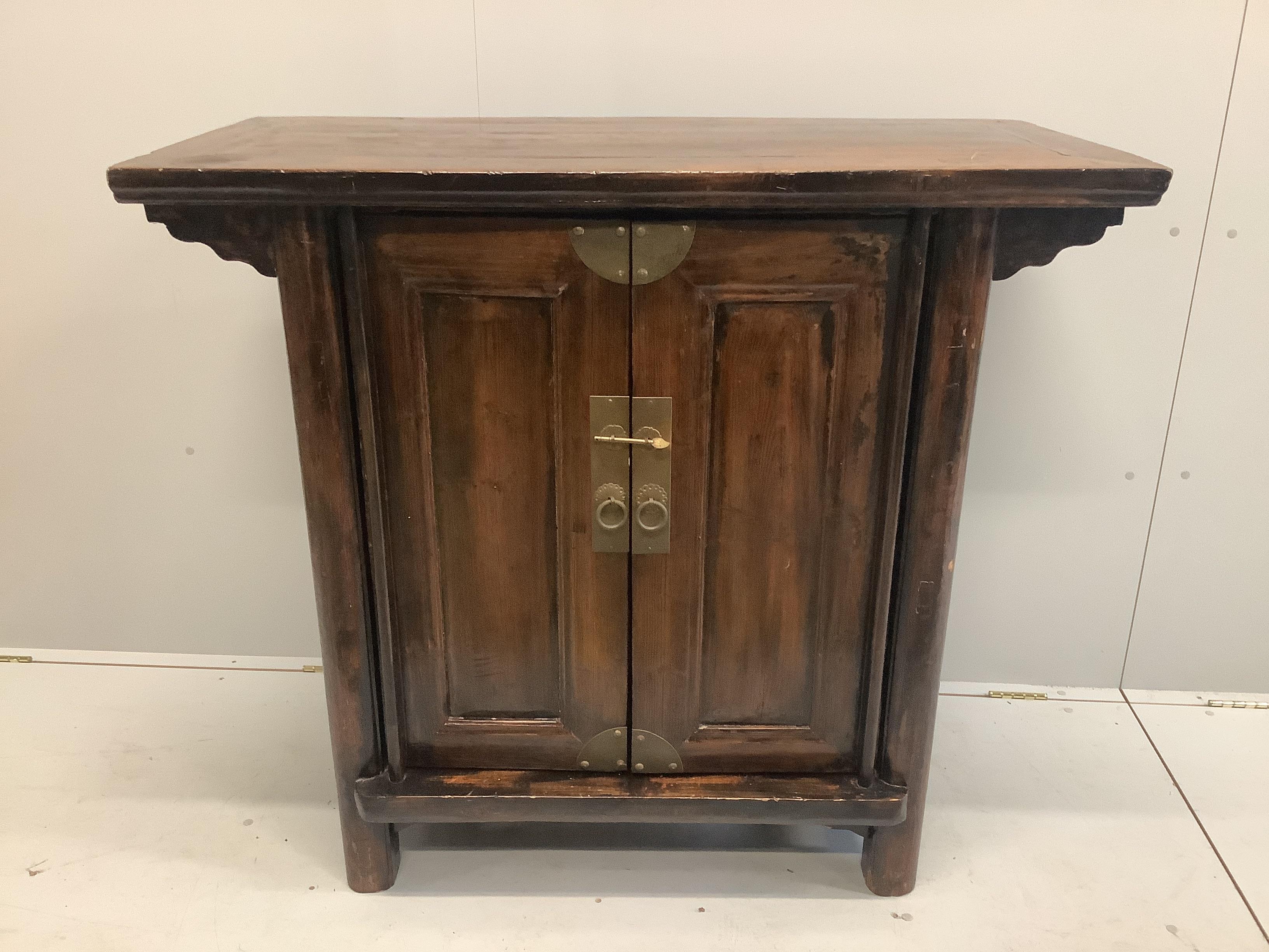 An India Jane Chinese pine two door side cabinet, width 120cm, depth 55cm, height 107cm
